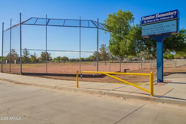 view of home's community with fence