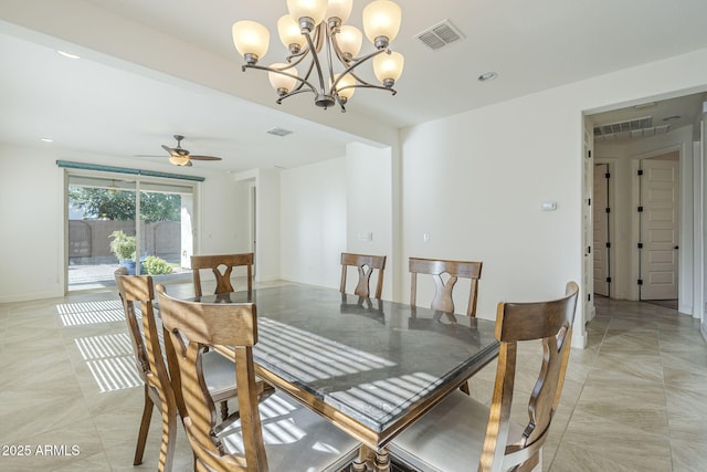 10609 E Durant Dr, Mesa, AZ 85212 - dining room featuring a chandelier, a ceiling fan, and baseboards