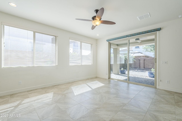10609 E Durant Dr, Mesa, AZ 85212 - spare room with healthy amount of natural light, a ceiling fan, baseboards, and recessed lighting