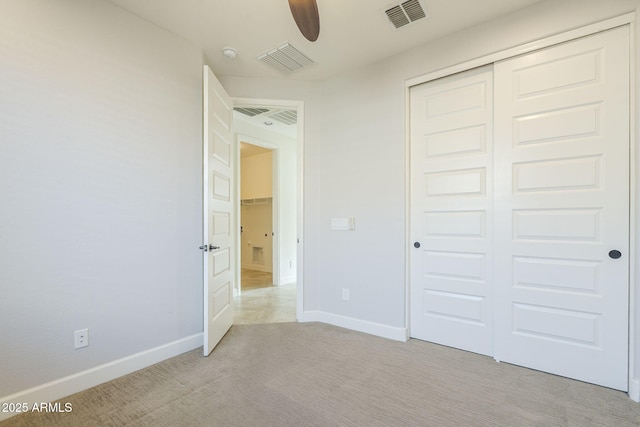 10609 E Durant Dr, Mesa, AZ 85212 - unfurnished bedroom with light carpet, a closet, baseboards, and a ceiling fan