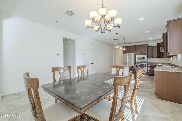 10609 E Durant Dr, Mesa, AZ 85212 - dining area with a chandelier and recessed lighting