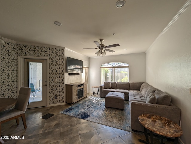 tiled living room featuring ceiling fan and crown molding