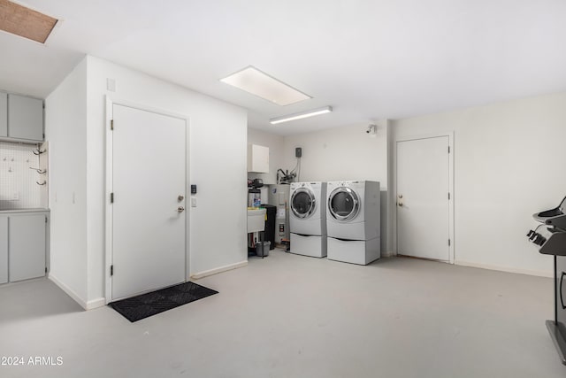 washroom featuring washer and dryer