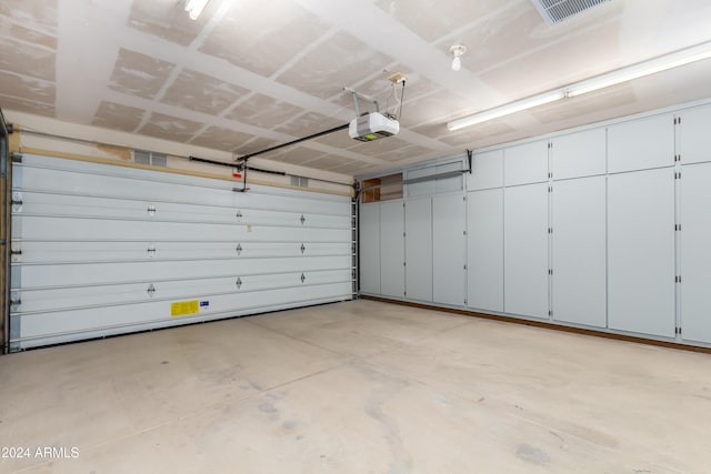 garage with a garage door opener