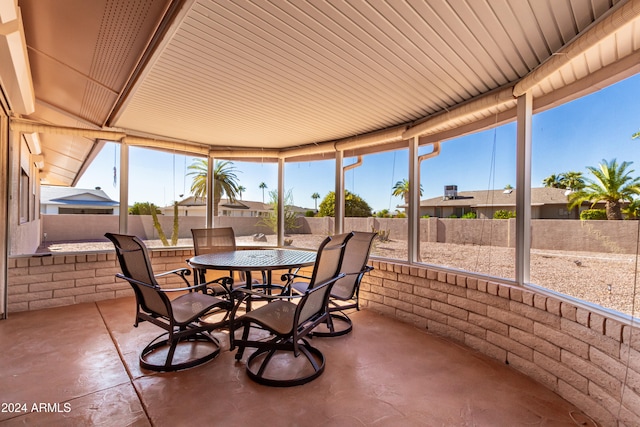 sunroom / solarium featuring a wealth of natural light