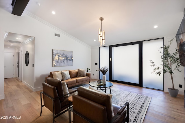 8708 E Rancho Vista Dr, Scottsdale, AZ 85251 - living area with vaulted ceiling, light wood-style floors, ornamental molding, and a chandelier