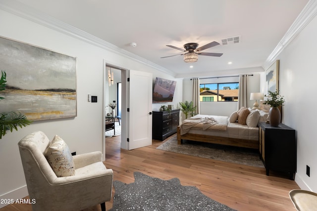 8708 E Rancho Vista Dr, Scottsdale, AZ 85251 - bedroom featuring ornamental molding, light wood-type flooring, a ceiling fan, and recessed lighting