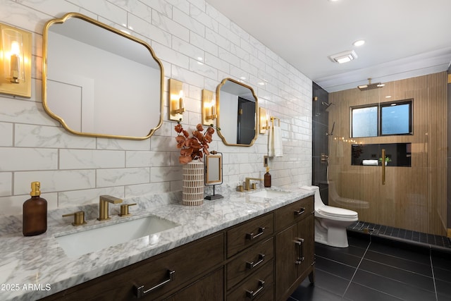 8708 E Rancho Vista Dr, Scottsdale, AZ 85251 - full bathroom with tile patterned floors, double vanity, a tile shower, tile walls, and decorative backsplash