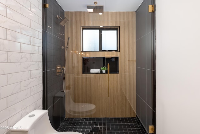 8708 E Rancho Vista Dr, Scottsdale, AZ 85251 - bathroom featuring a tile shower and tile walls