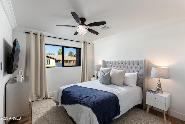 8708 E Rancho Vista Dr, Scottsdale, AZ 85251 - bedroom featuring ornamental molding, wood finished floors, and a ceiling fan