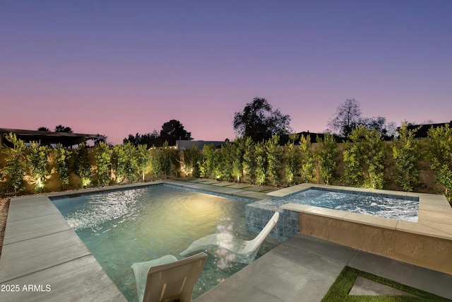 8708 E Rancho Vista Dr, Scottsdale, AZ 85251 - pool at dusk with a fenced backyard and a pool with connected hot tub
