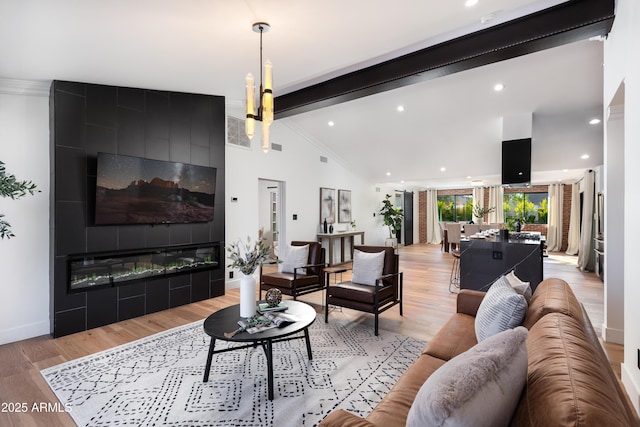 8708 E Rancho Vista Dr, Scottsdale, AZ 85251 - living room featuring light wood-style floors, a fireplace, and recessed lighting