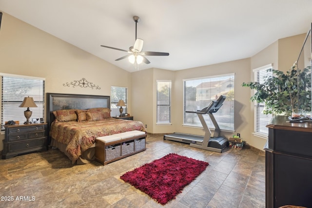 bedroom featuring ceiling fan and lofted ceiling