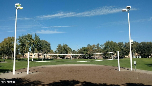 view of home's community with a yard