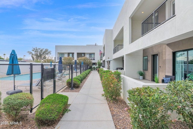 view of property's community featuring a swimming pool