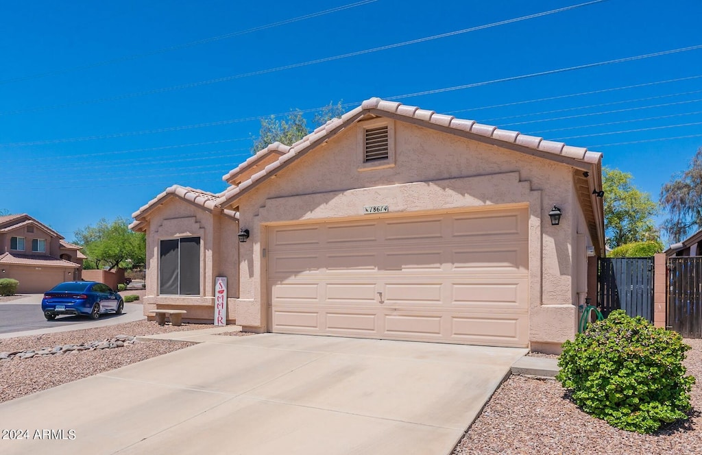 view of front of property featuring a garage