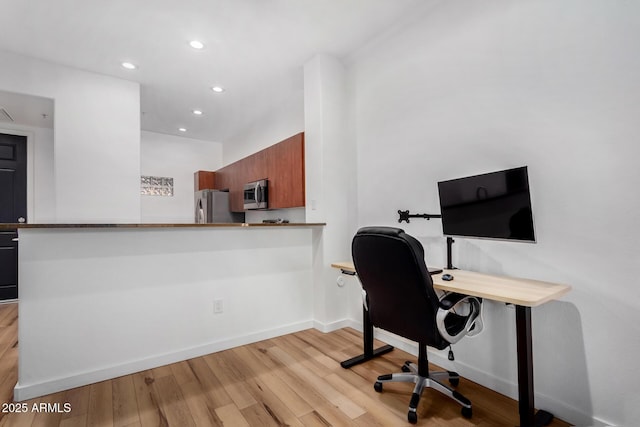 office featuring light hardwood / wood-style floors