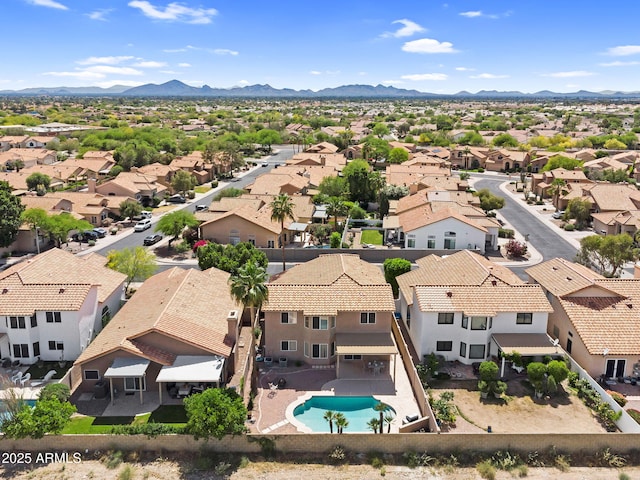 aerial view featuring a mountain view and a residential view