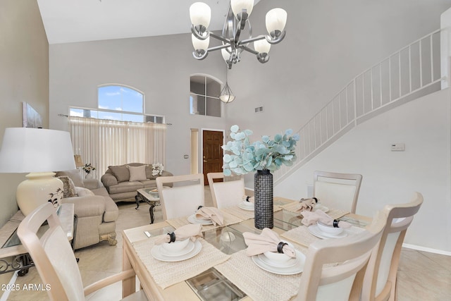 dining space with stairway, visible vents, high vaulted ceiling, and a notable chandelier