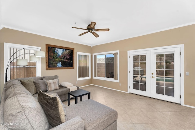 living area featuring light tile patterned floors, baseboards, a ceiling fan, french doors, and crown molding