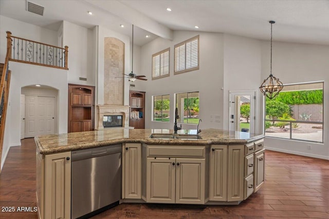 6102 E Danbury Rd, Scottsdale, AZ 85254 - kitchen with dishwasher, cream cabinetry, high vaulted ceiling, a ceiling fan, and open floor plan