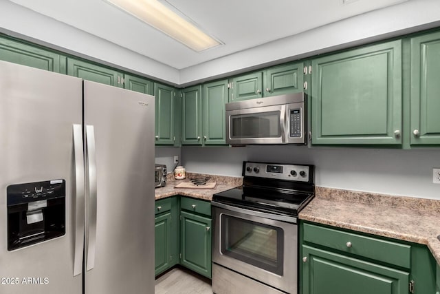 2121 W Union Hills Dr Unit 113, Phoenix, AZ 85027 - kitchen featuring appliances with stainless steel finishes, light countertops, and light wood-style flooring