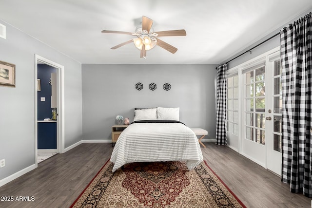 2121 W Union Hills Dr Unit 113, Phoenix, AZ 85027 - bedroom with wood finished floors, baseboards, and ceiling fan