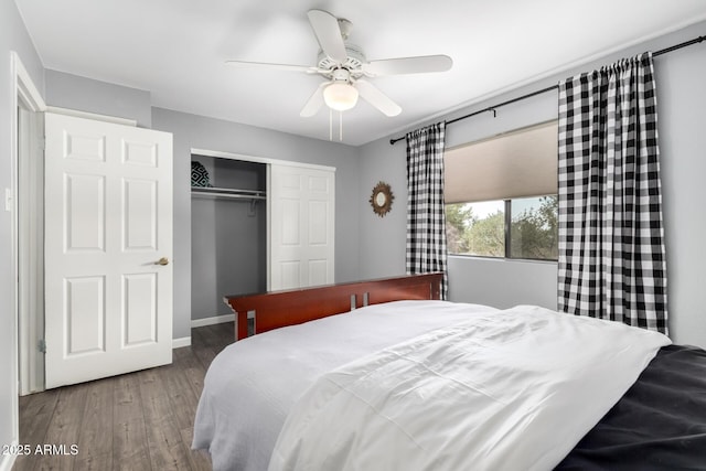 2121 W Union Hills Dr Unit 113, Phoenix, AZ 85027 - bedroom featuring a closet, wood finished floors, ceiling fan, and baseboards