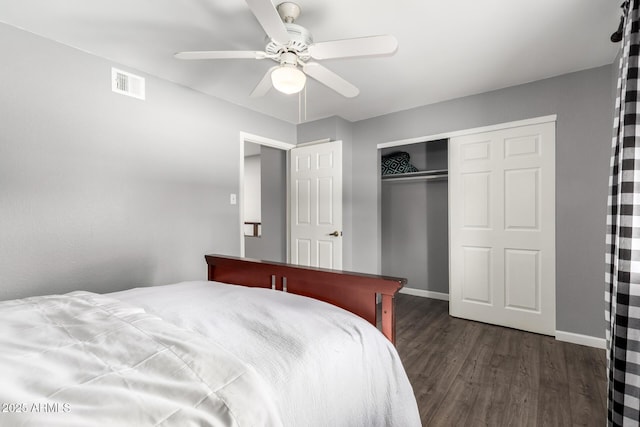 2121 W Union Hills Dr Unit 113, Phoenix, AZ 85027 - bedroom featuring dark wood-style flooring, baseboards, a closet, and ceiling fan