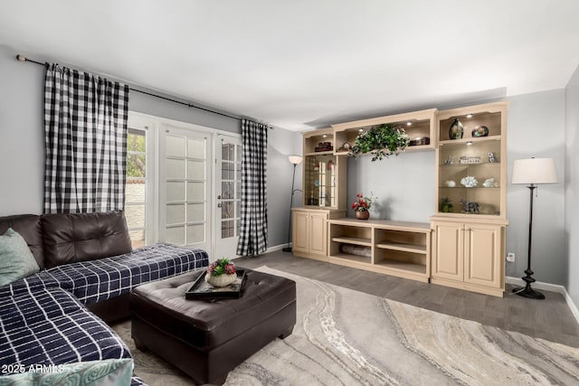 2121 W Union Hills Dr Unit 113, Phoenix, AZ 85027 - living area featuring baseboards and light wood-style floors