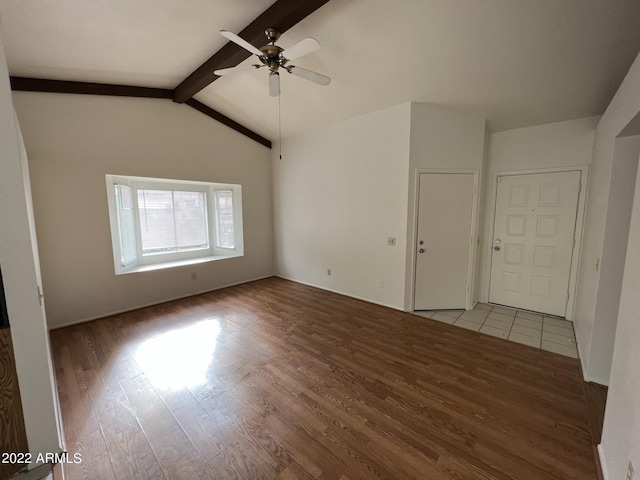 1770 E Sandra Ter, Phoenix, AZ 85022 - unfurnished living room featuring ceiling fan, lofted ceiling with beams, and light hardwood / wood-style floors