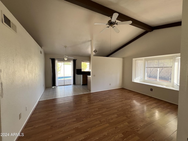 1770 E Sandra Ter, Phoenix, AZ 85022 - unfurnished living room with vaulted ceiling with beams, ceiling fan, and light hardwood / wood-style floors