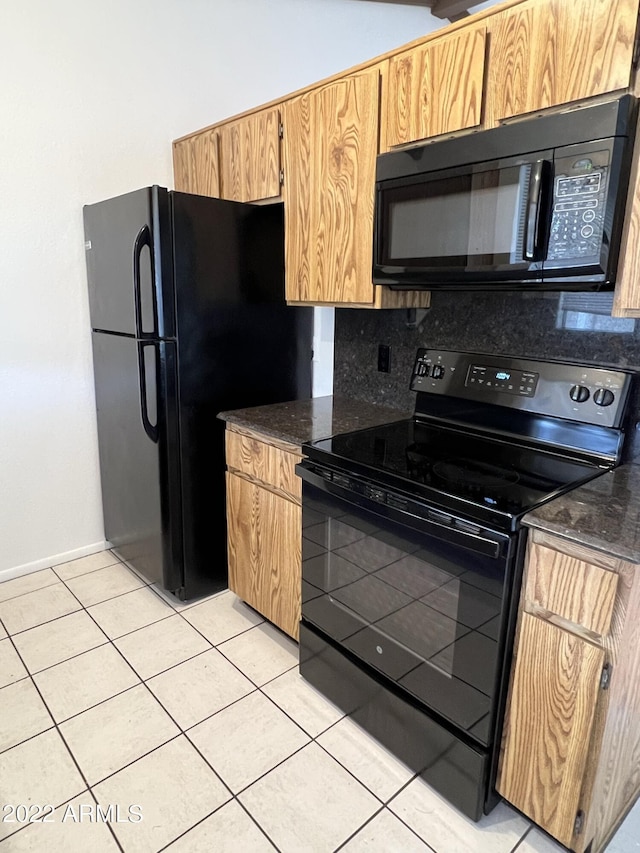 1770 E Sandra Ter, Phoenix, AZ 85022 - kitchen with black appliances, light tile patterned flooring, backsplash, and dark stone counters