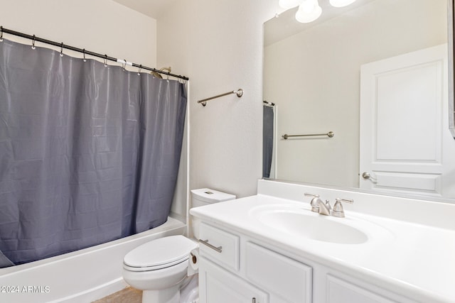 full bathroom featuring vanity, toilet, and shower / tub combo