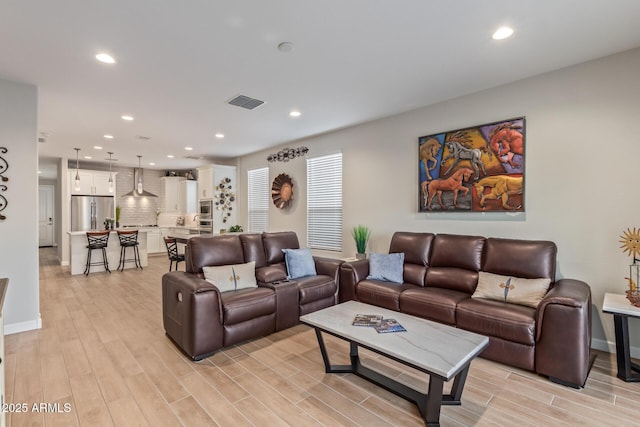 living room featuring light hardwood / wood-style flooring