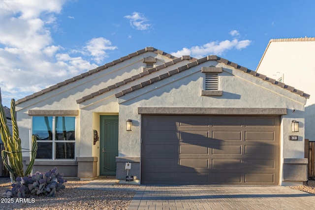 view of front of property featuring a garage