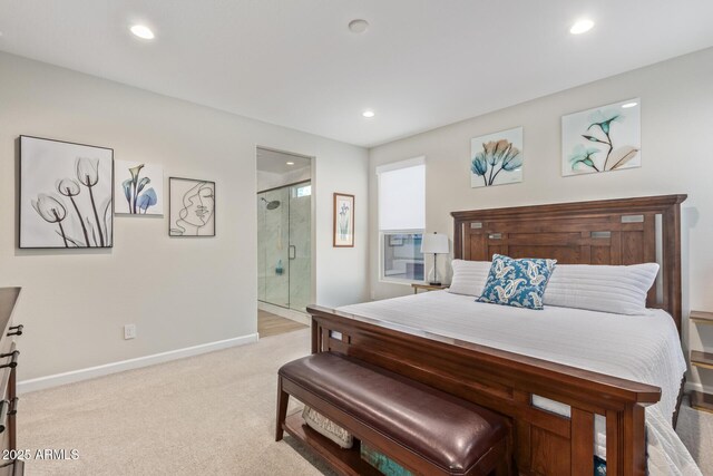 carpeted bedroom featuring ensuite bathroom