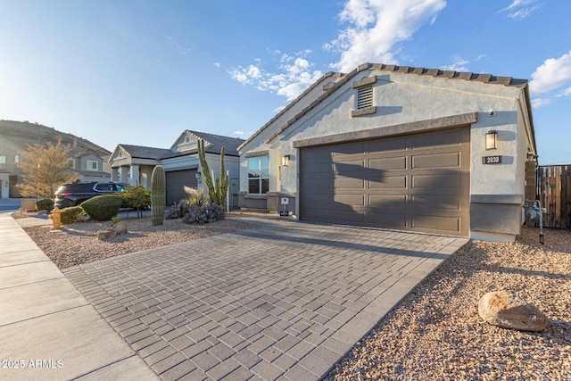 view of front of property featuring a garage