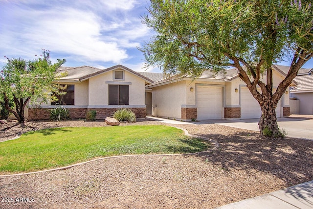 single story home featuring a garage and a front yard