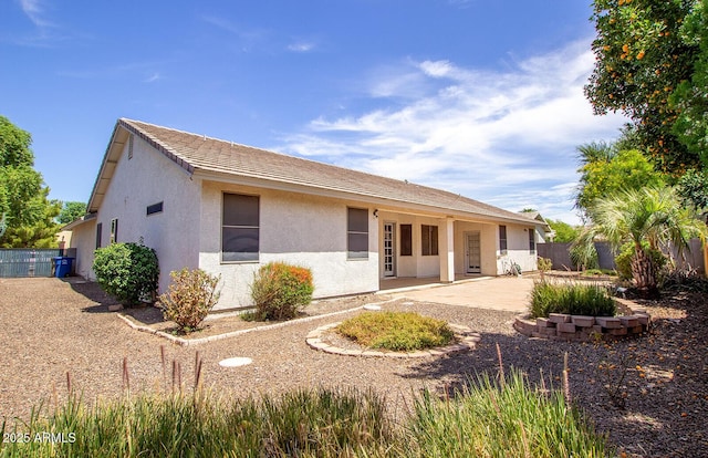 back of house featuring a patio