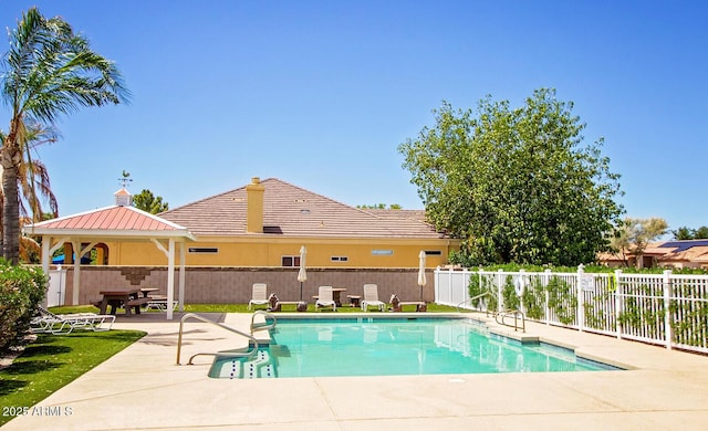 view of pool with a gazebo and a patio area