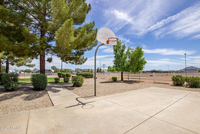 view of patio / terrace with basketball hoop