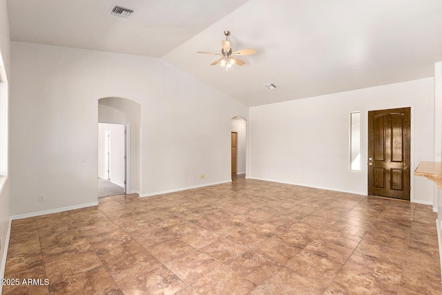 spare room with high vaulted ceiling and ceiling fan