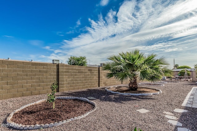 view of yard with fence