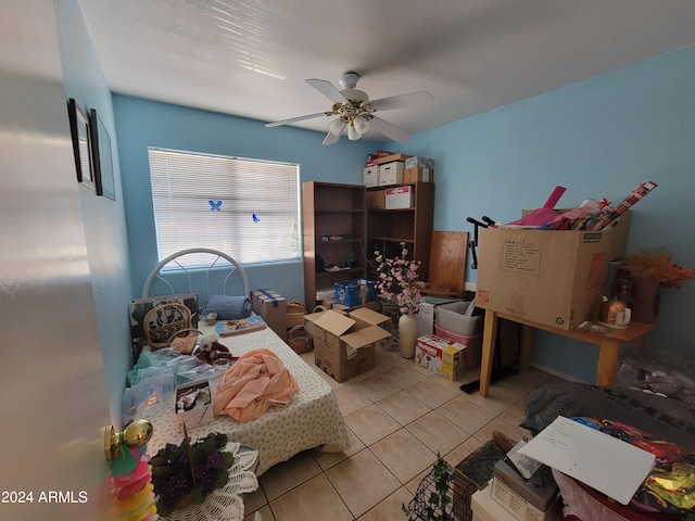 interior space featuring ceiling fan