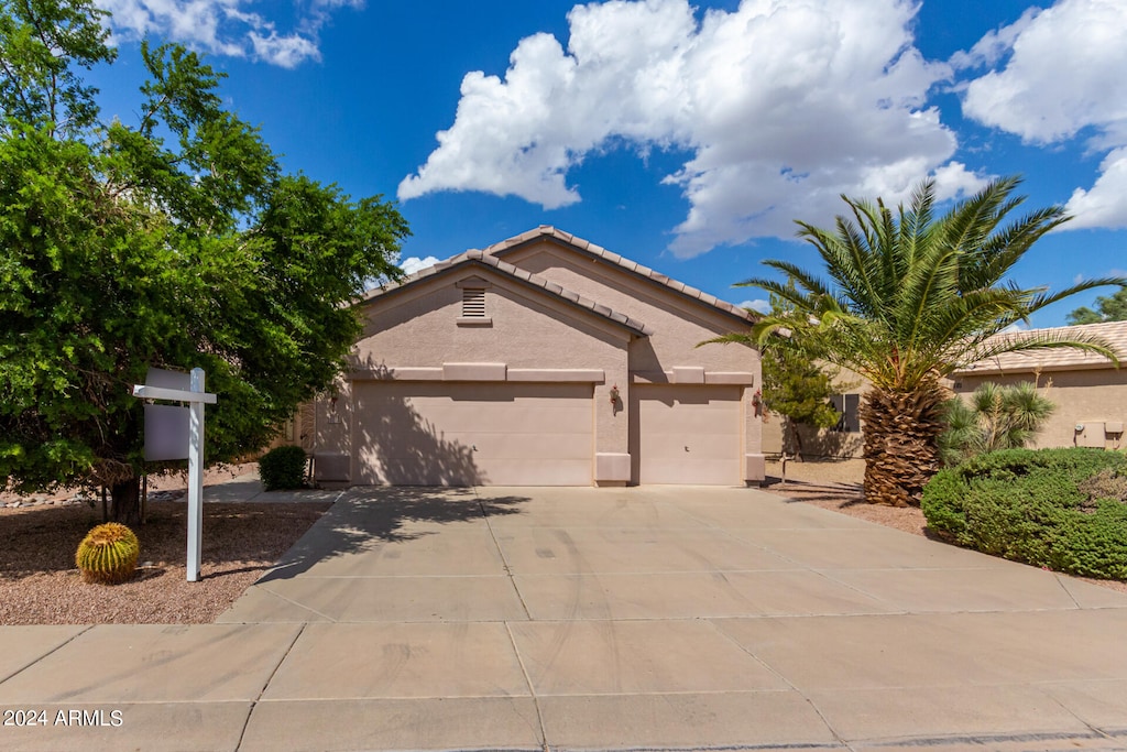 view of front of home with a garage