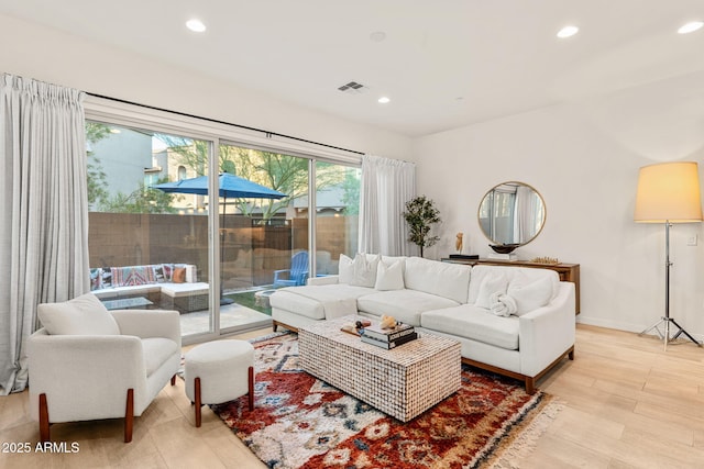 23083 N 74th Pl, Scottsdale, AZ 85255 - living room featuring recessed lighting and light wood-style flooring
