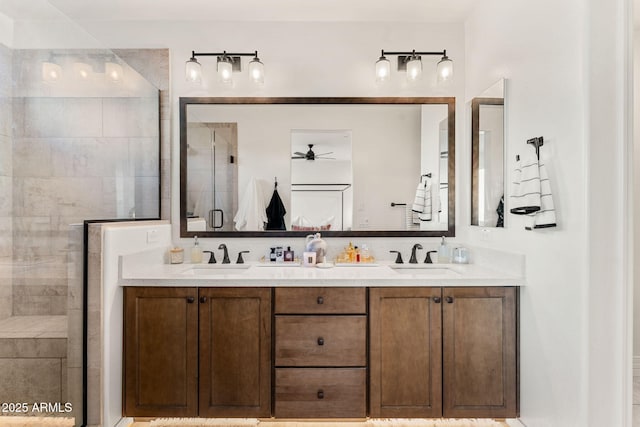 23083 N 74th Pl, Scottsdale, AZ 85255 - full bathroom featuring a tile shower, double vanity, and a ceiling fan