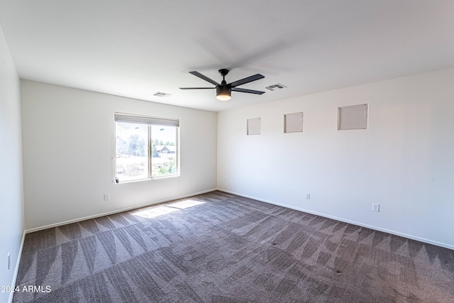 unfurnished room featuring carpet floors and ceiling fan