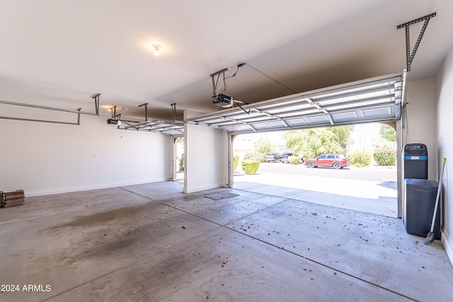 garage featuring a carport and a garage door opener